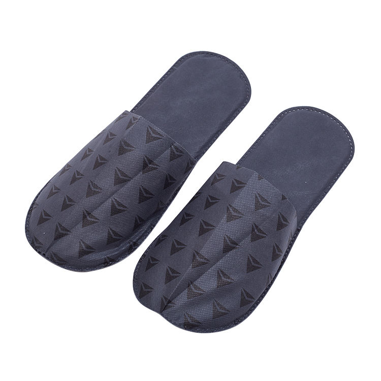 Factory Direct Gray Printed Non-Woven Hotel Slippers – Affordable One-Piece Disposable Footwear for Bulk Hotels & SPA