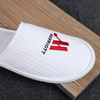 Custom White Waffle Hotel Slippers – Soft Luxury Disposable Footwear for Hotels, B2B Bulk Supplier & Manufacturer
