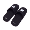 Custom Black Waffle Hotel Slippers – Spa & Luxury Disposable Footwear for Hotels, B2B Supplier & Manufacturer