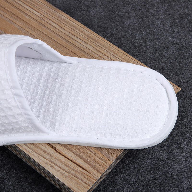 Custom White Waffle Hotel Slippers – Soft Luxury Disposable Footwear for Hotels, B2B Bulk Supplier & Manufacturer