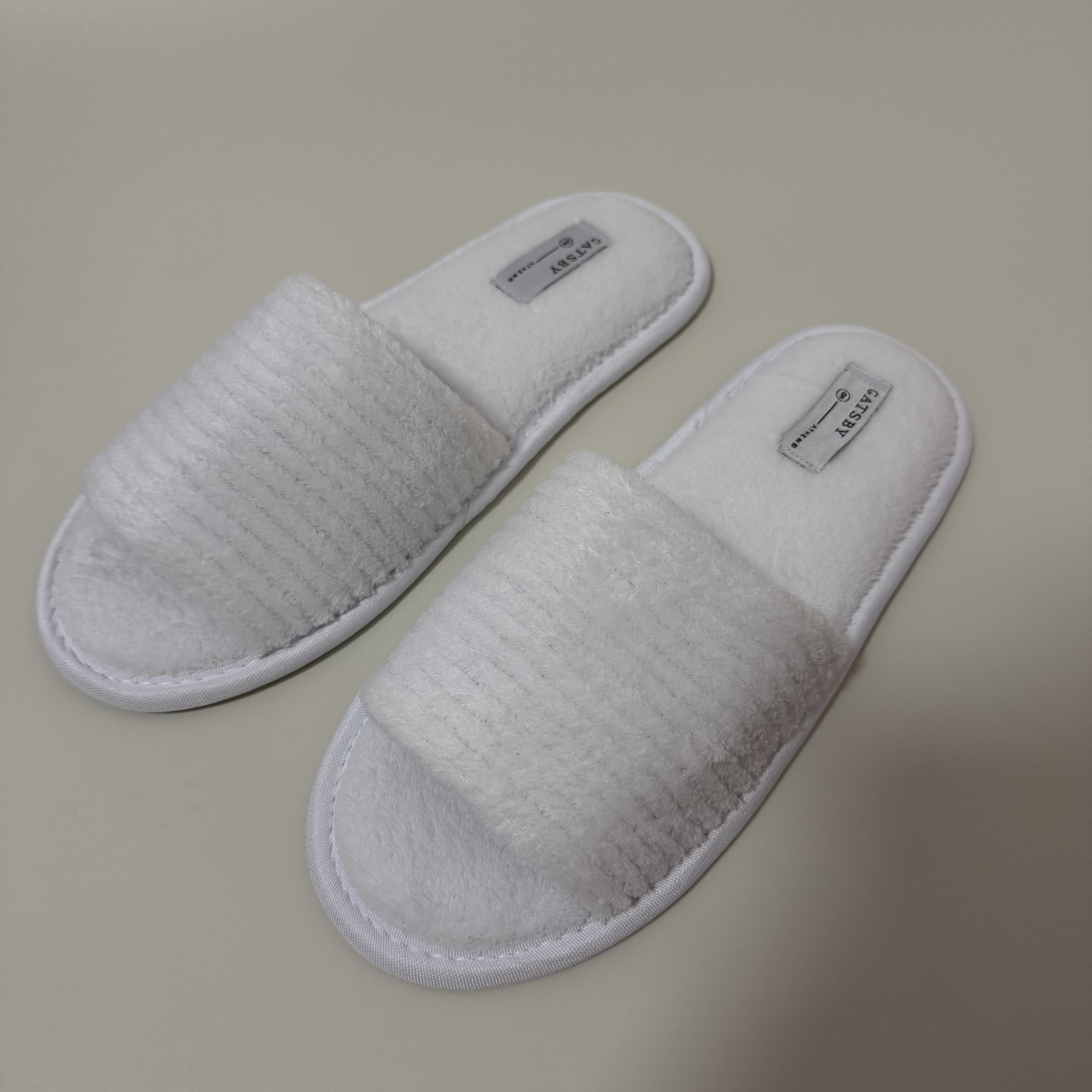 Custom White Open Toe Coral Fleece Hotel Slippers Manufacturer | Wholesale Soft Hospitality Slippers