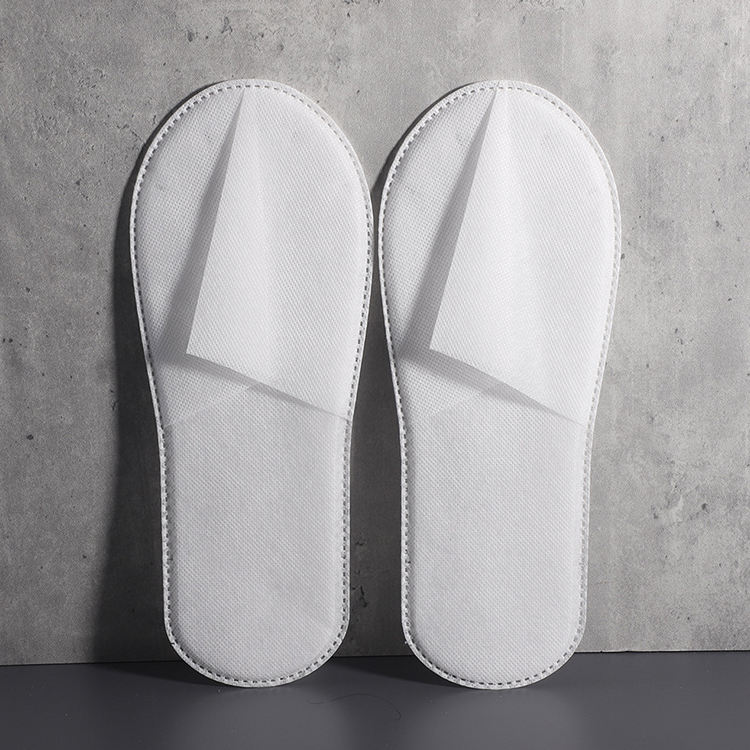 Custom White One-Piece Non-Woven Hotel Slippers – Affordable Disposable Non-Slip Footwear for Hotels & SPA, B2B Supplier & Manufacturer