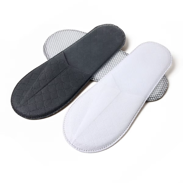 Bulk Gray & White One-Piece Non-Woven Hotel Slippers – Factory Direct Affordable Disposable Slippers for Hotels & Spa